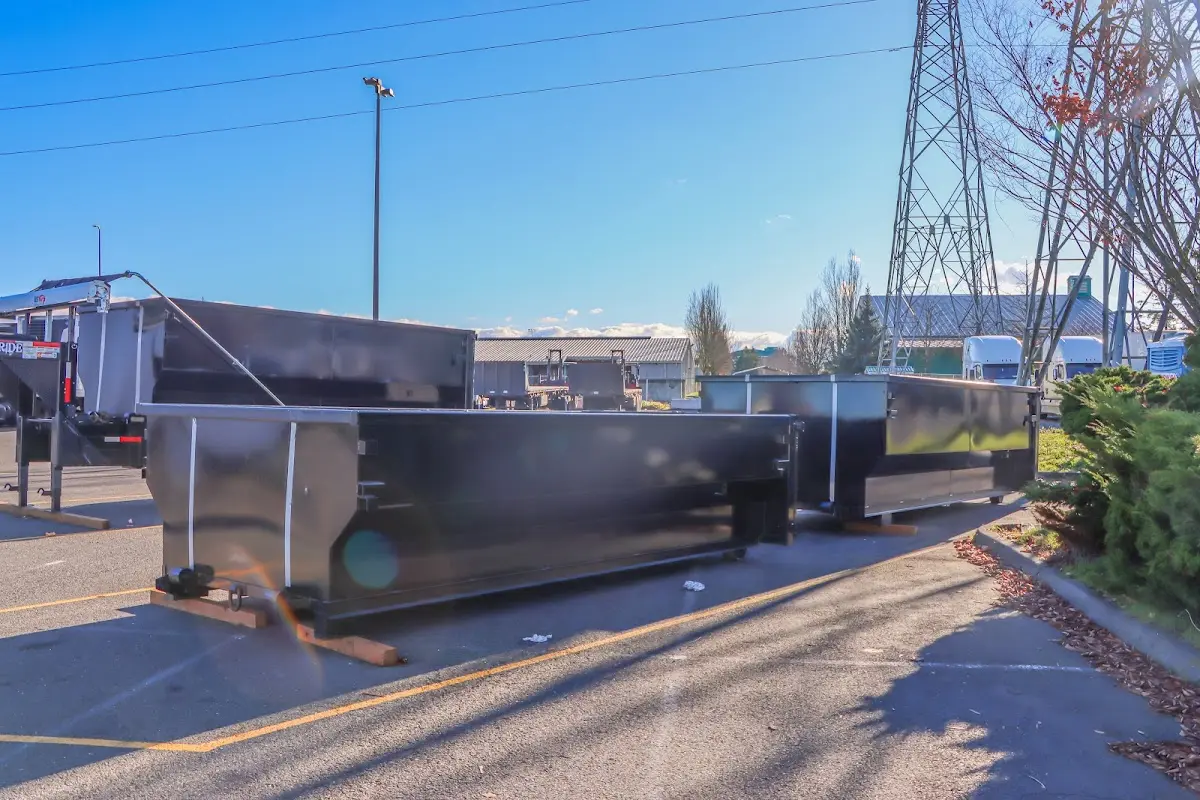 Roll-off dumpster ready for waste disposal at job site for Roll Off Dumpster Rental in The Meadows